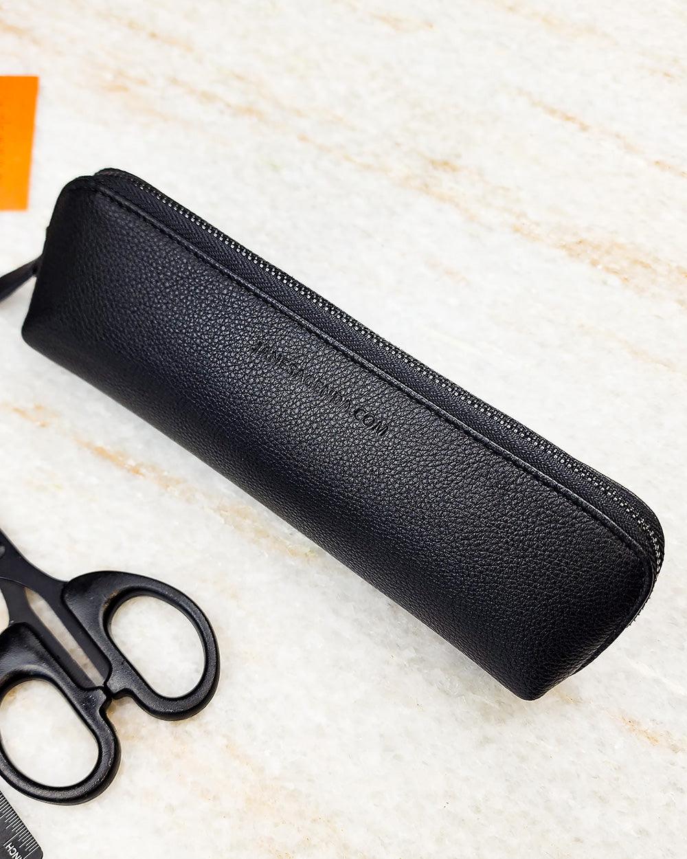 Black vegan leather pen pouch with a gun-metal zipper for holding all of your pens and planner accessories by Jane's Agenda.