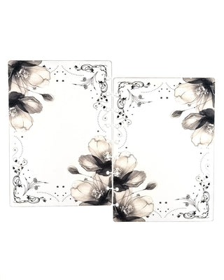 Front and back clear discbound planner covers featuring elegant black-and-white floral artwork with delicate botanical flourishes and decorative scroll accents.