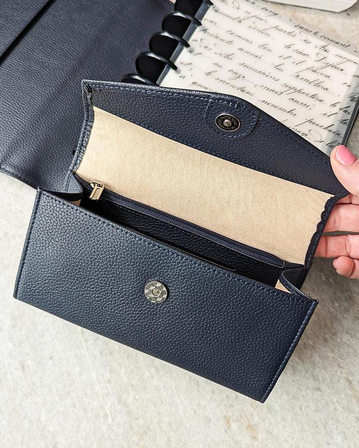 Sunglass case and wallet clutch in midnight blue vegn leather, with a pebble grain finish by Jane's Agenda.