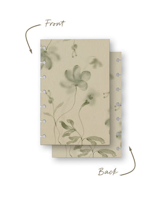 Front and back views of a removable discbound planner dashboard featuring soft watercolor wildflowers and delicate greenery on a warm cream background. Both sides display coordinating botanical artwork for an elegant, nature-inspired look.