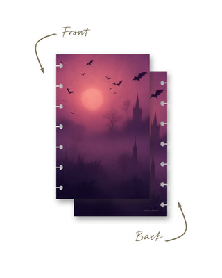 Front and back views of a discbound planner dashboard featuring a misty purple and pink night scene with a glowing moon, flying bats, bare trees, and shadowy castle towers.