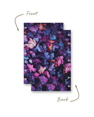 Front and back views of a discbound planner dashboard featuring a vibrant pattern of layered autumn leaves in deep purple, blue, pink, and burgundy tones.