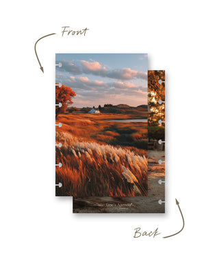 Front and back views of a Jane’s Agenda discbound planner dashboard featuring a warm autumn landscape with golden grasses, orange trees, a white farmhouse, rolling hills, and a softly clouded sky.