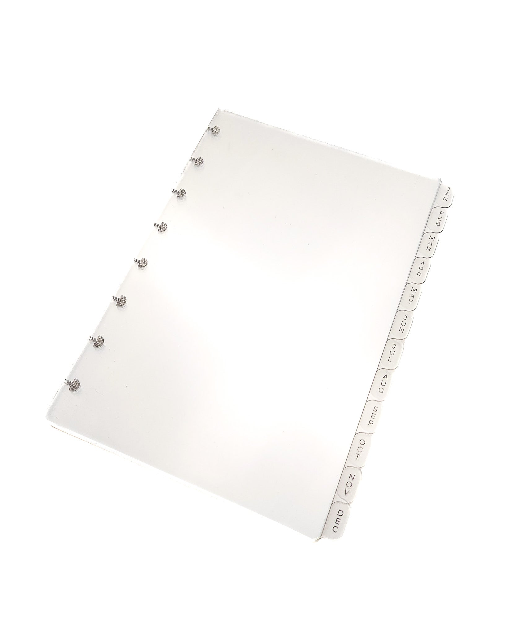 Clear monthly tabbed planner dividers for discbound planners, disc notebooks, and A5 planner sizes by Jane's Agenda.