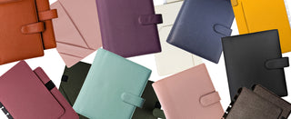 Disc planner covers in various colors of vegan leather for disc-bound planner systems.