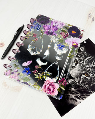 Jane's Agenda dark floral botanical Discbound Planner Cover with crystal chandelier dashboard on lavender binding discs — Discbound Planning system with leopard print Planner dashboard and black dividers