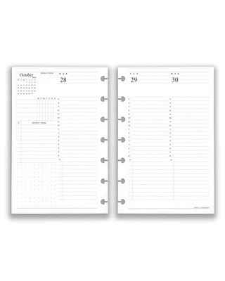 Two discbound punched planner pages showing a daily calendar layout with grid and checklist sections.