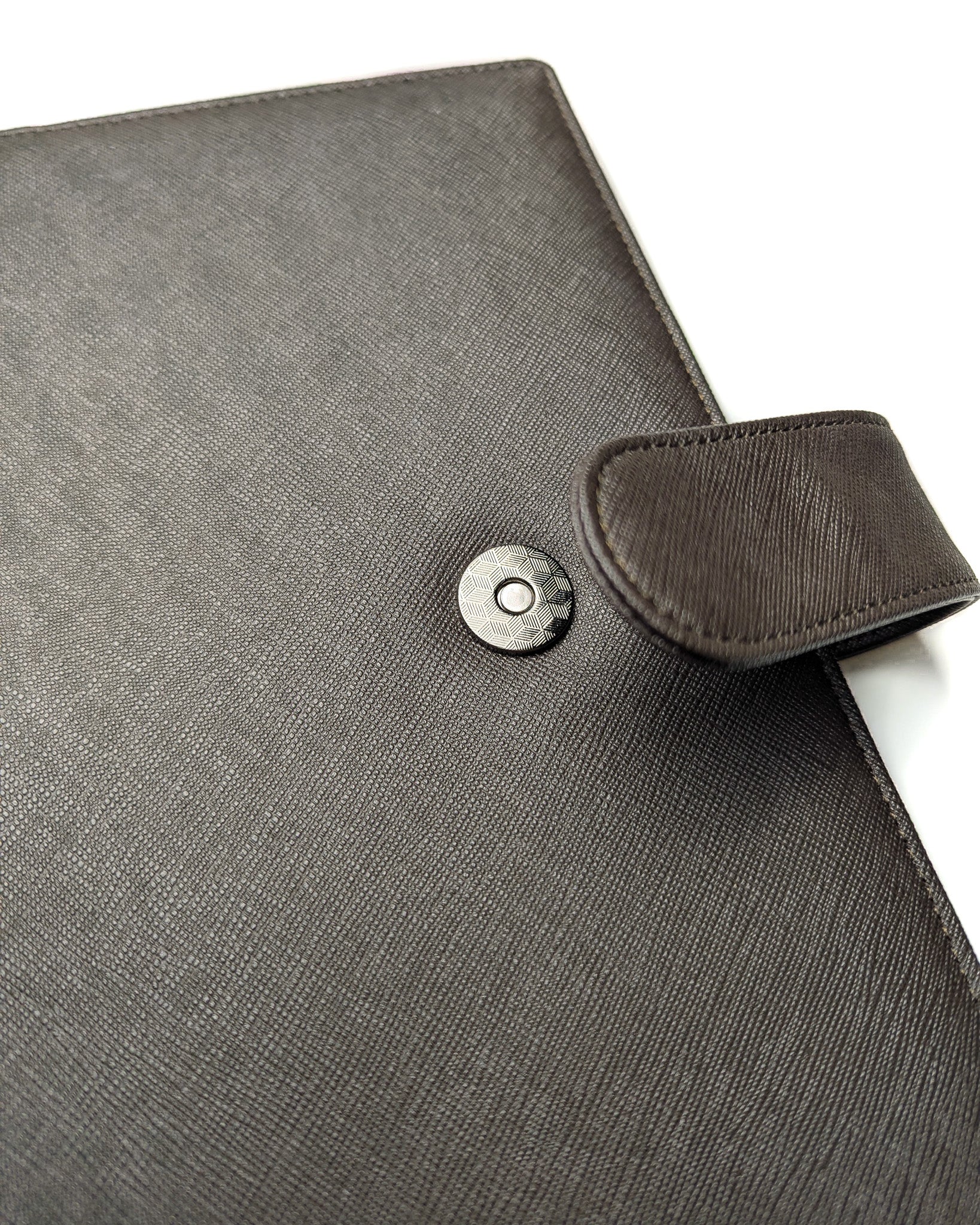 Discbound chocolate saffiano leather planner cover by Jane's Agenda.