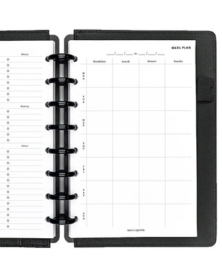 Black planner with meal plan and to-do list sections on a white background