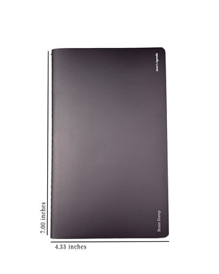 Black softcover “Brain Dump” notebook by Jane’s Agenda with a minimalist design. Dimensions shown: 7 inches tall by 4.33 inches wide.