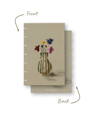 Front and back view of a removable discbound planner dashboard featuring a hand-painted green striped vase filled with delicate wildflowers in shades of blue, yellow, burgundy, and pink on a soft cream background. The coordinating back has a matching cream finish with a subtle painted shadow and Jane’s Agenda branding.