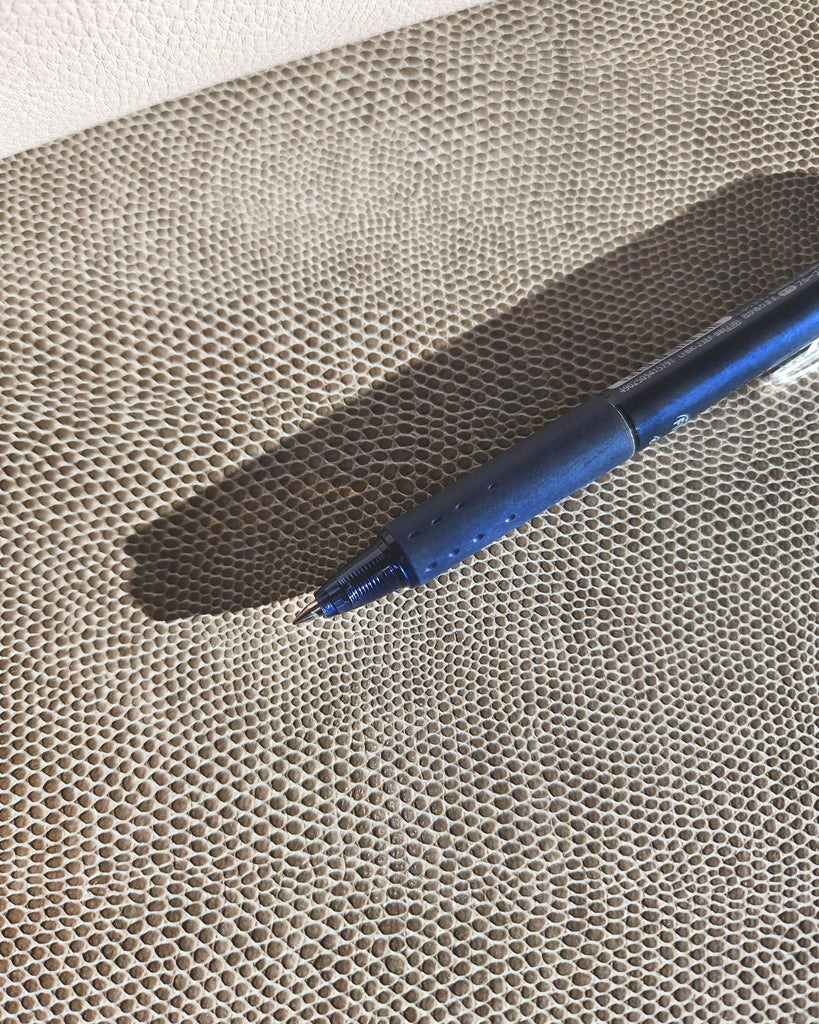 Erasable Pilot Frixion Pen in blue ink.