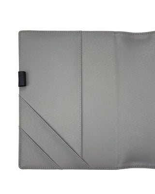 Gray Vegan leather planner wrap cover showing off the three side pockets and one penloop on a white background.