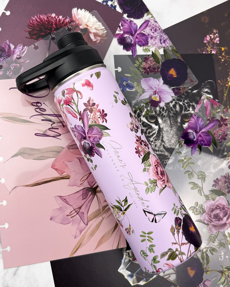 Purple floral metal water bottle styled with lavender florals