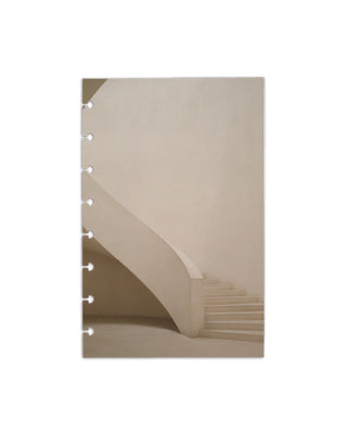 A minimalist beige spiral stairway disc bound planner dashboards on a white background.