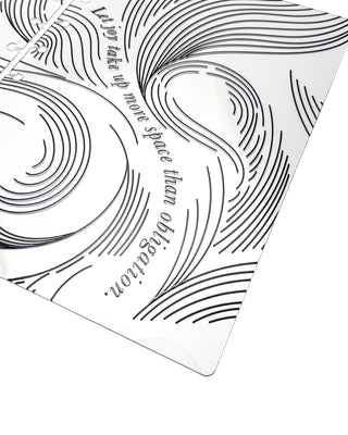 Close-up of a clear discbound planner cover with flowing black abstract line artwork and the quote, “Let joy take up more space than obligation.”