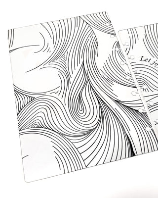 Close-up of the back clear discbound planner cover featuring flowing black abstract line artwork with a modern, minimalist design.
