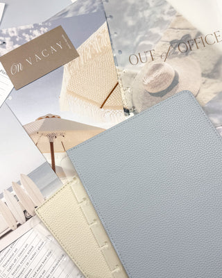 Jane's Agenda light blue and sand beige reversible vegan leather Discbound Planner Cover with coastal travel themed Dashboards and Planner Inserts — summer vacation planning system