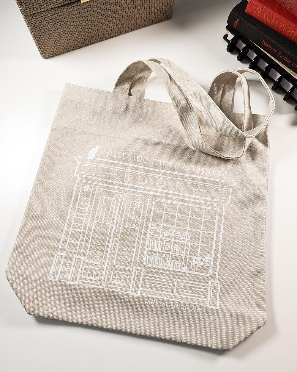 Library tote bag with a cute image and quote by Jane's Agenda.