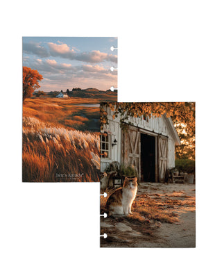 Two discbound planner dashboards featuring warm autumn countryside scenes: one with golden grasses, orange fall trees, rolling hills, and a small white farmhouse beneath a cloudy blue sky; the other with a calico cat sitting outside a rustic white barn surrounded by golden fall foliage.