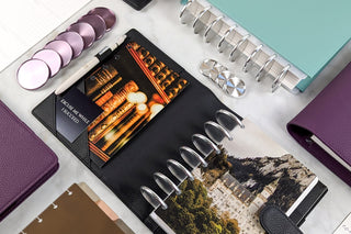 Collection of planners and organizers on a white surface