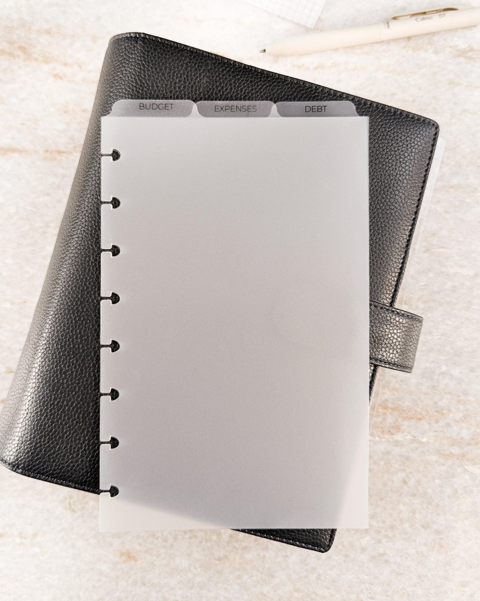 Top tabbed plastic dividers by Jane's Agenda for discbound and six ring planner systems and disc notebooks.