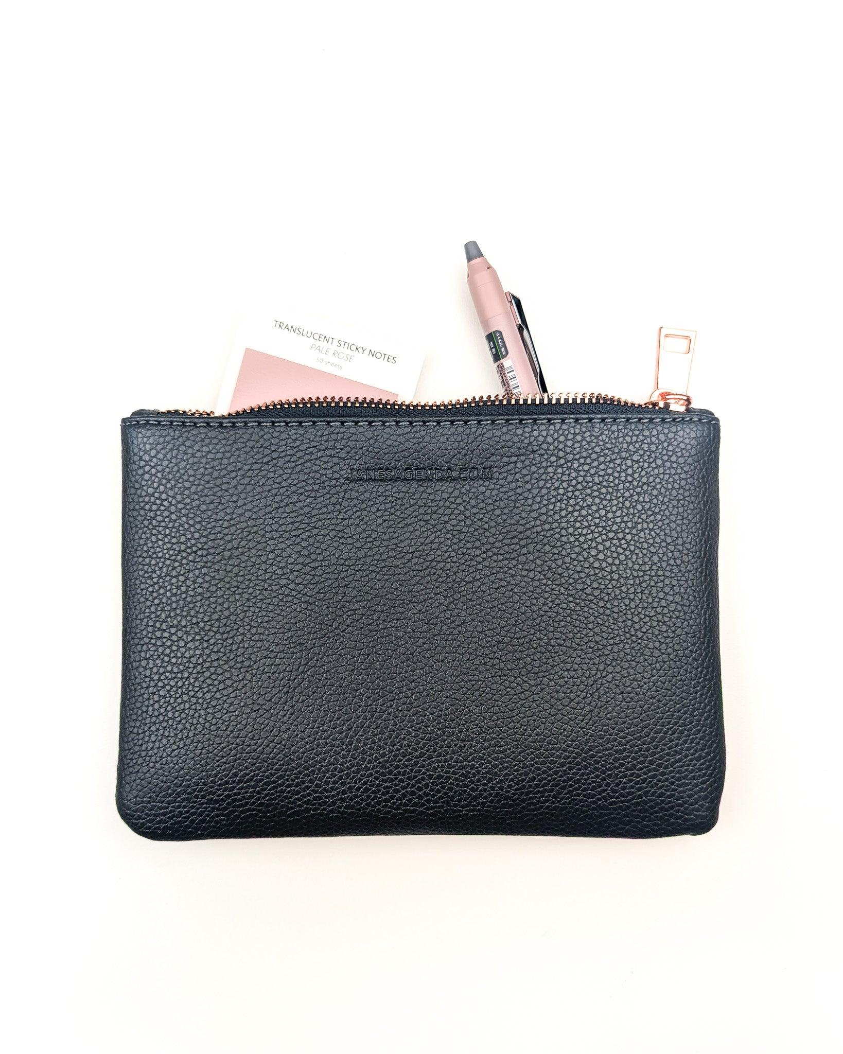 Vegan leather pen and accessories pouch in a soft pebble grain finish with a rose gold metal zipper by Jane's Agenda.