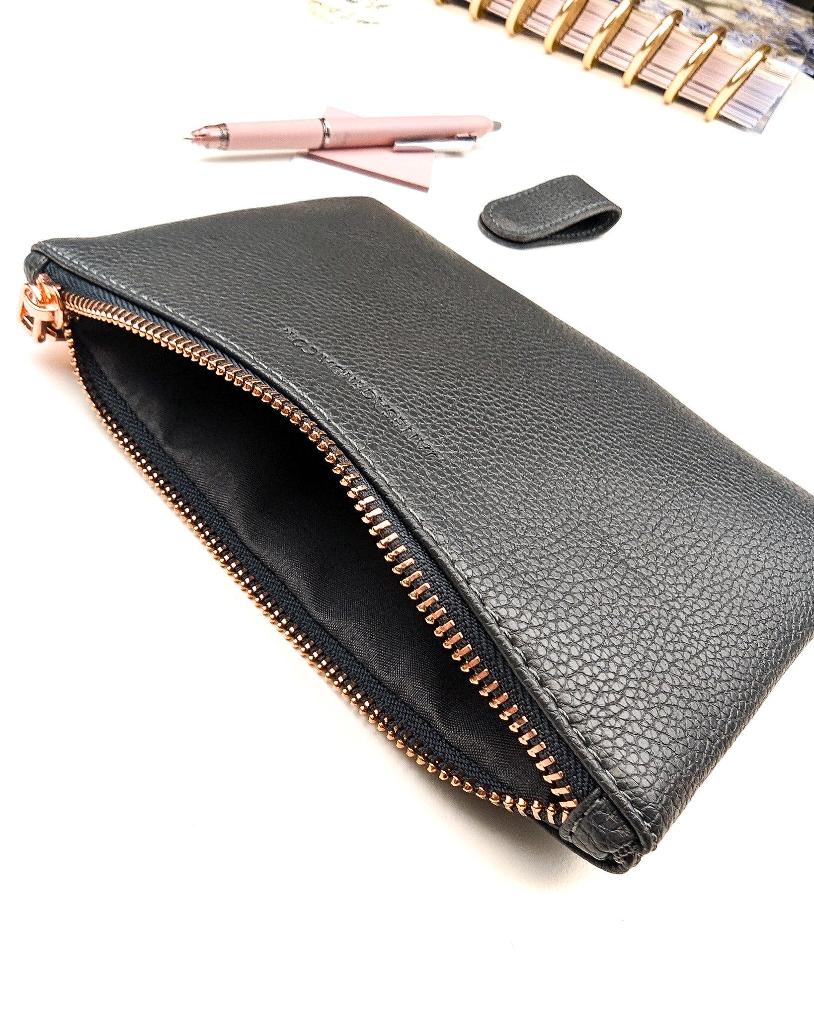 Vegan leather pen and accessories pouch in a soft pebble grain finish with a rose gold metal zipper by Jane's Agenda.