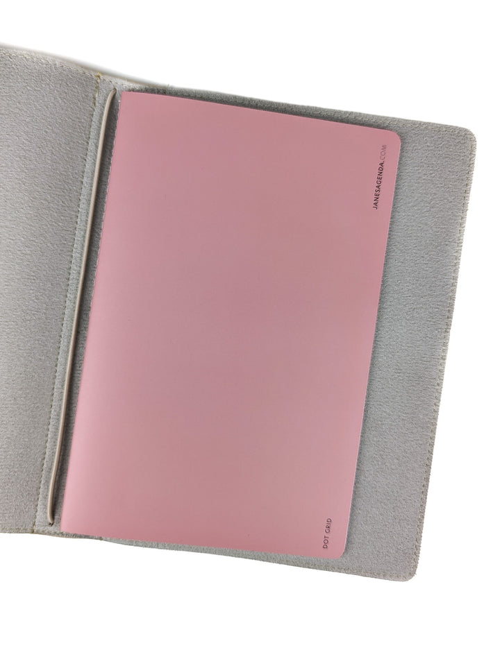 Dot grid journal saddle stitch notebook in blush pink by Jane's Agenda.