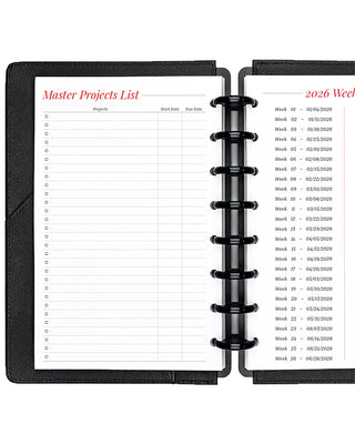 Project planner inserts inside a black discbound planner notebook over a white background.