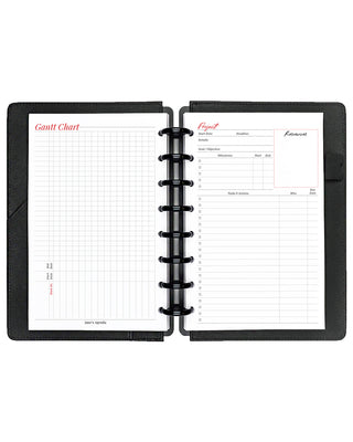 Project planner inserts inside a black discbound planner notebook over a white background.