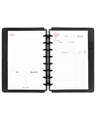 Project planner inserts inside a black discbound planner notebook over a white background.