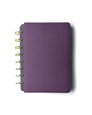 Closed purple snap planner cover from Jane's Agenda with gold disc-bound rings