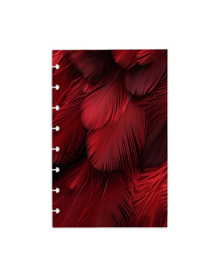 Red feathers discbound planner dashboard over a white background.