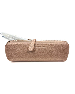 Rose Gold Vegan leather zipper pen pouch with pens sticking out thed top of the open silver metal zipper, on a white background.