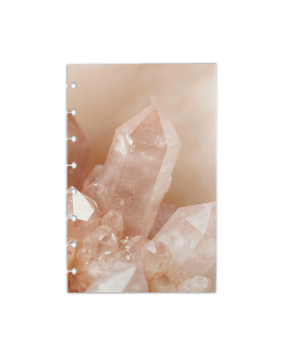 A pink quarts crystal design on discbound cardstock dashboard over a white background. 