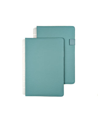Light teal vegan leather discbound planner cover overlayed on a white background