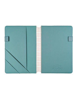 Light teal vegan leather discbound planner cover with three pockets and two elastic pen loops overlayed on a white background