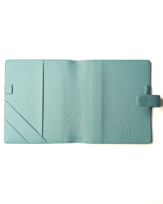 Inside view of the Sea Glass planner wrap cover showing pockets and pen loop
