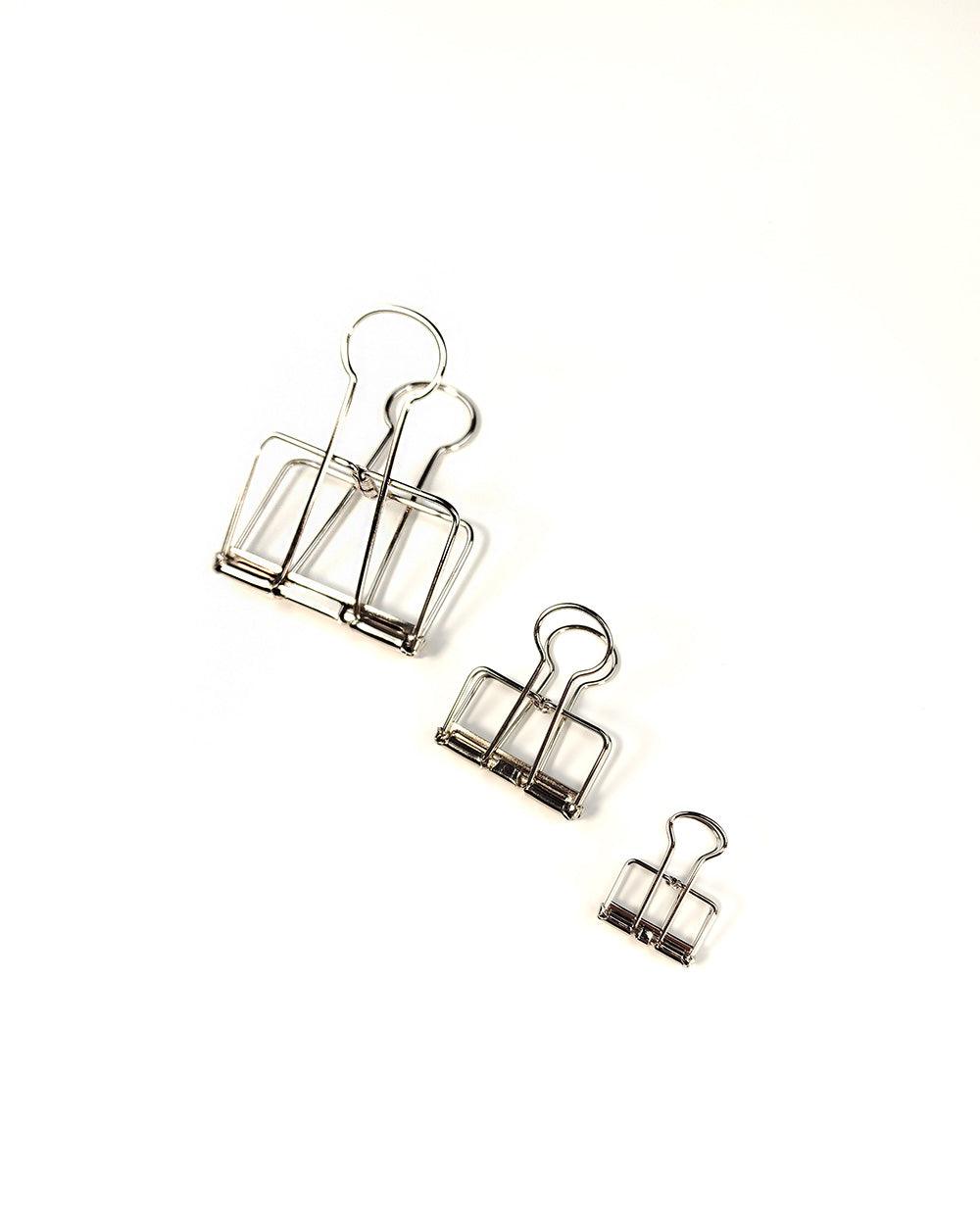 Silver binder clearance clips