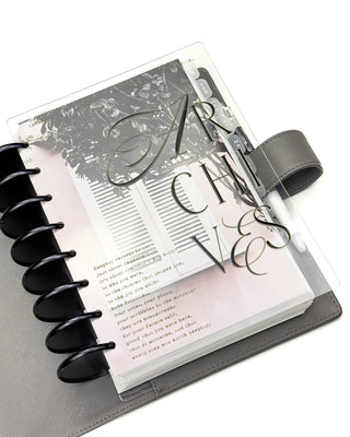 Planner with a clear cover displaying the word 'ARCHIVES' on a white background