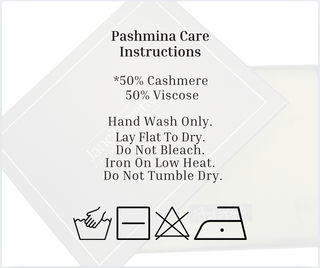 Pashmina care instructions label with washing symbols on a white background