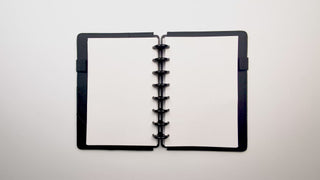 The set of 5 dashboards being popped into a planner and flipped slowly to show that they are front and back images. 