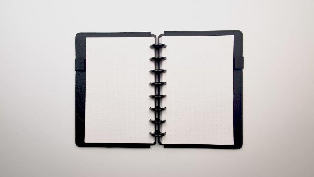 The set of 5 dashboards being popped into a planner and flipped slowly to show that they are front and back images. 