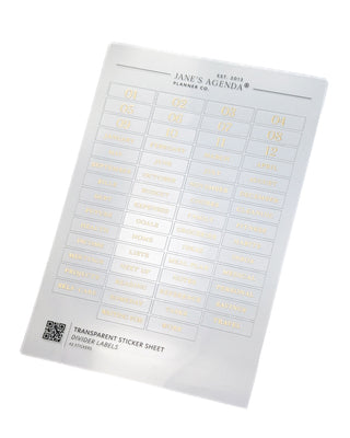 Sheet of transparent gold foil divider labels on a white background