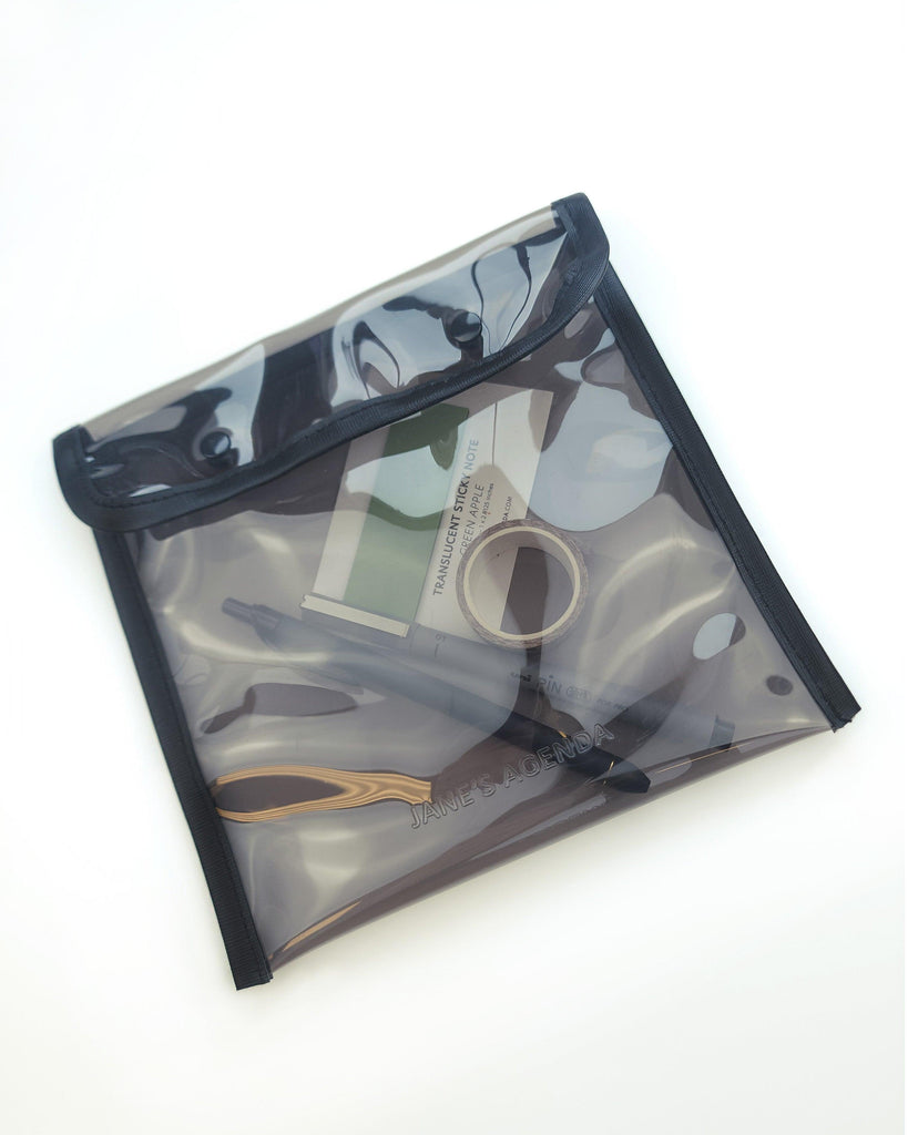 Clear black plastic pen pouch and case for all your desk accessories by Jane's Agenda.