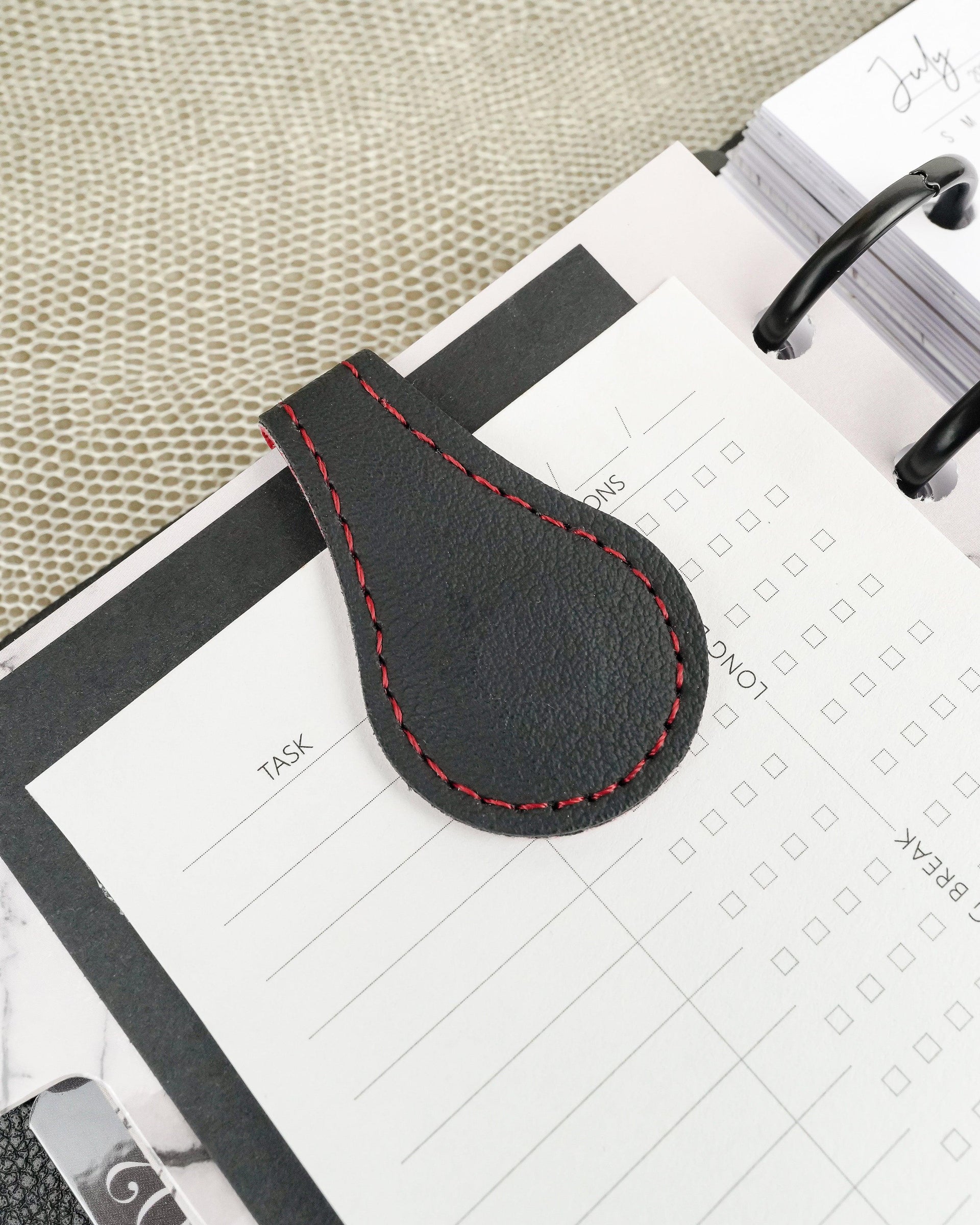 Custom made red bottom magnetic vegan leather planner clip by Jane's Agenda®.