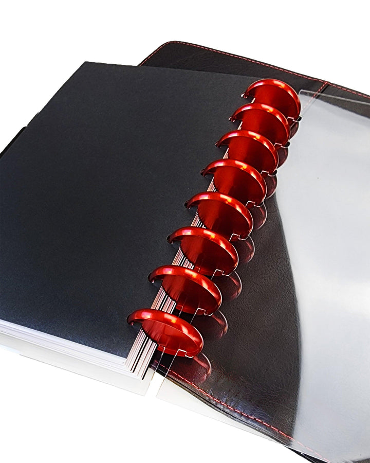 Red metal planner discs for discbound planners and planner notebooks by Janes Agenda.