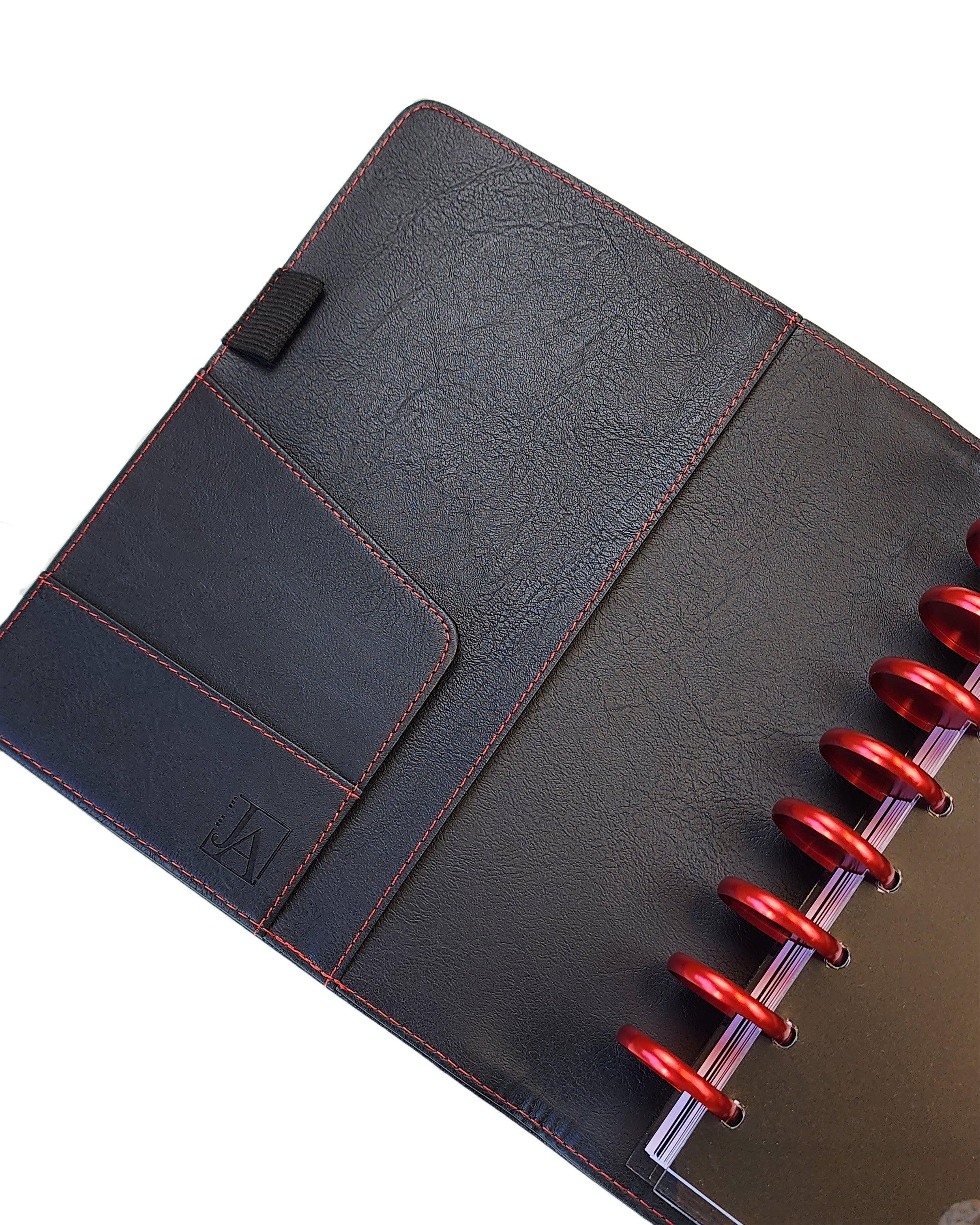 Vegan leather in black with red stitching discbound planner cover and planner notebook portfolio for discbound planners by Janes Agenda.