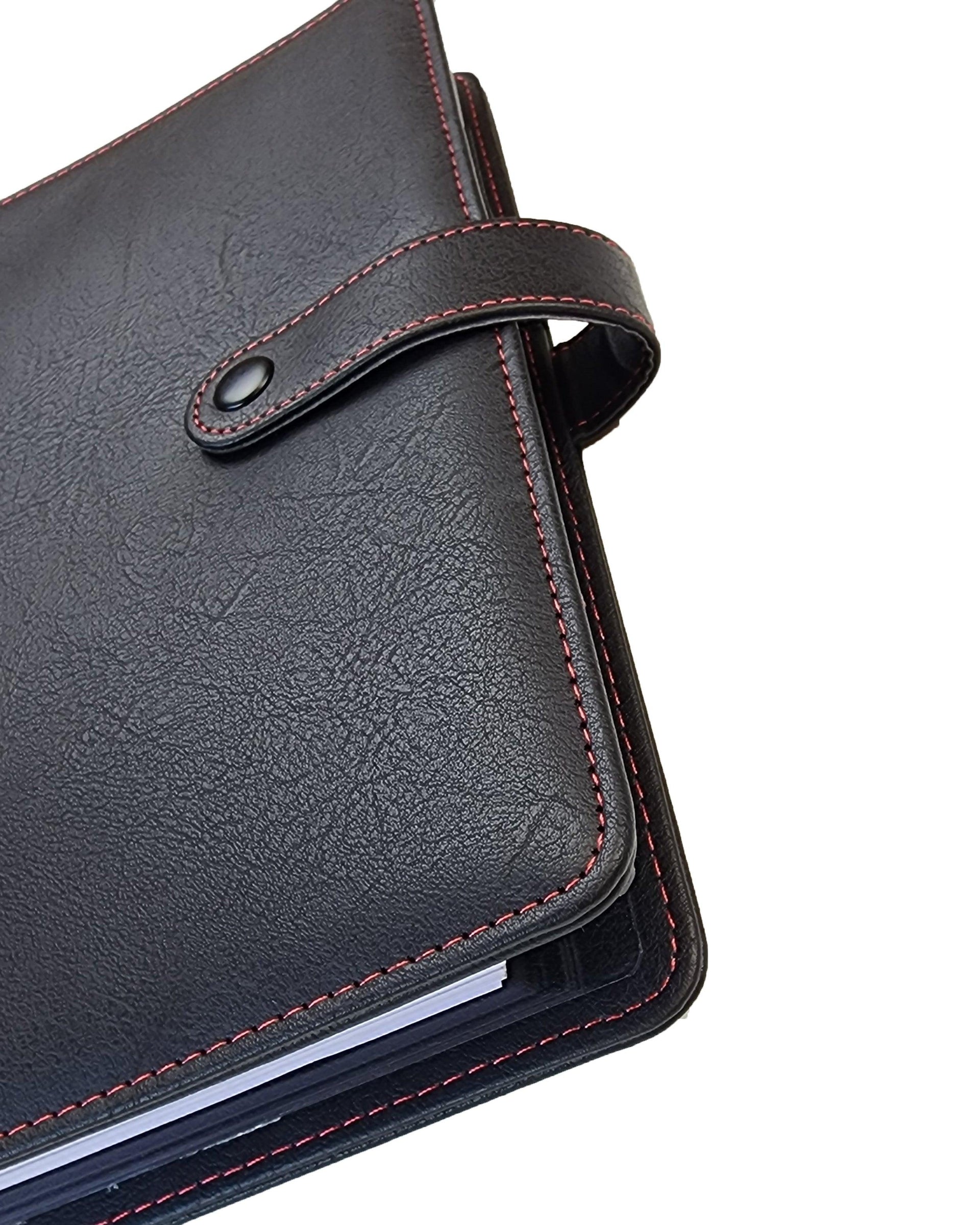 Vegan leather in black with red stitching discbound planner cover and planner notebook portfolio for discbound planners by Janes Agenda.
